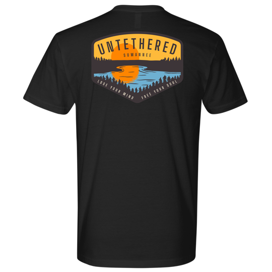 Untethered Collection design with sunset and water in foreground. With text of Untethered, Suwannee, and a tagline of Lose Your Mind. Free Your Soul by Suwannee Brand Apparel